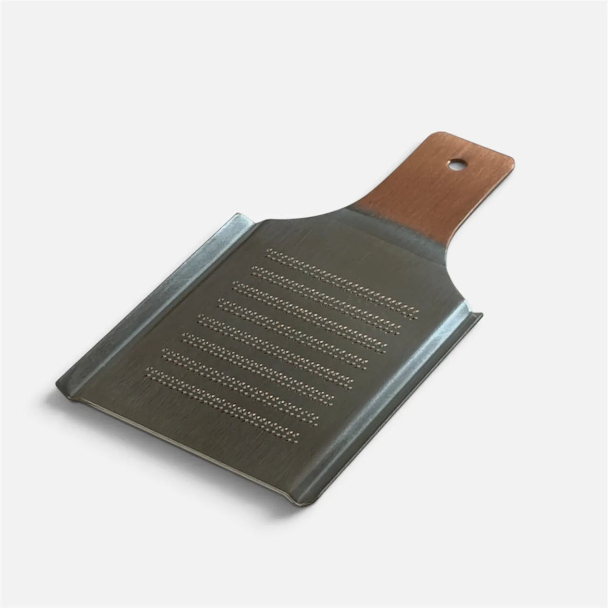 Fine side of the copper oroshigane grater