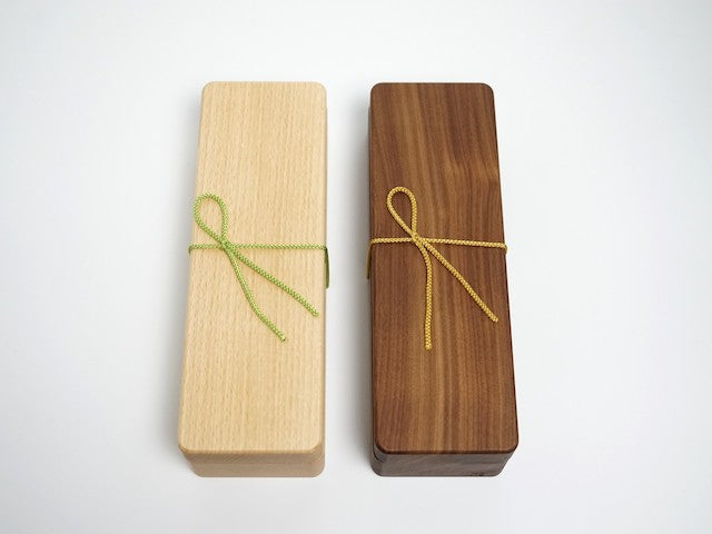 Beech and walnut katsuobushi shavers tied with a gift cord
