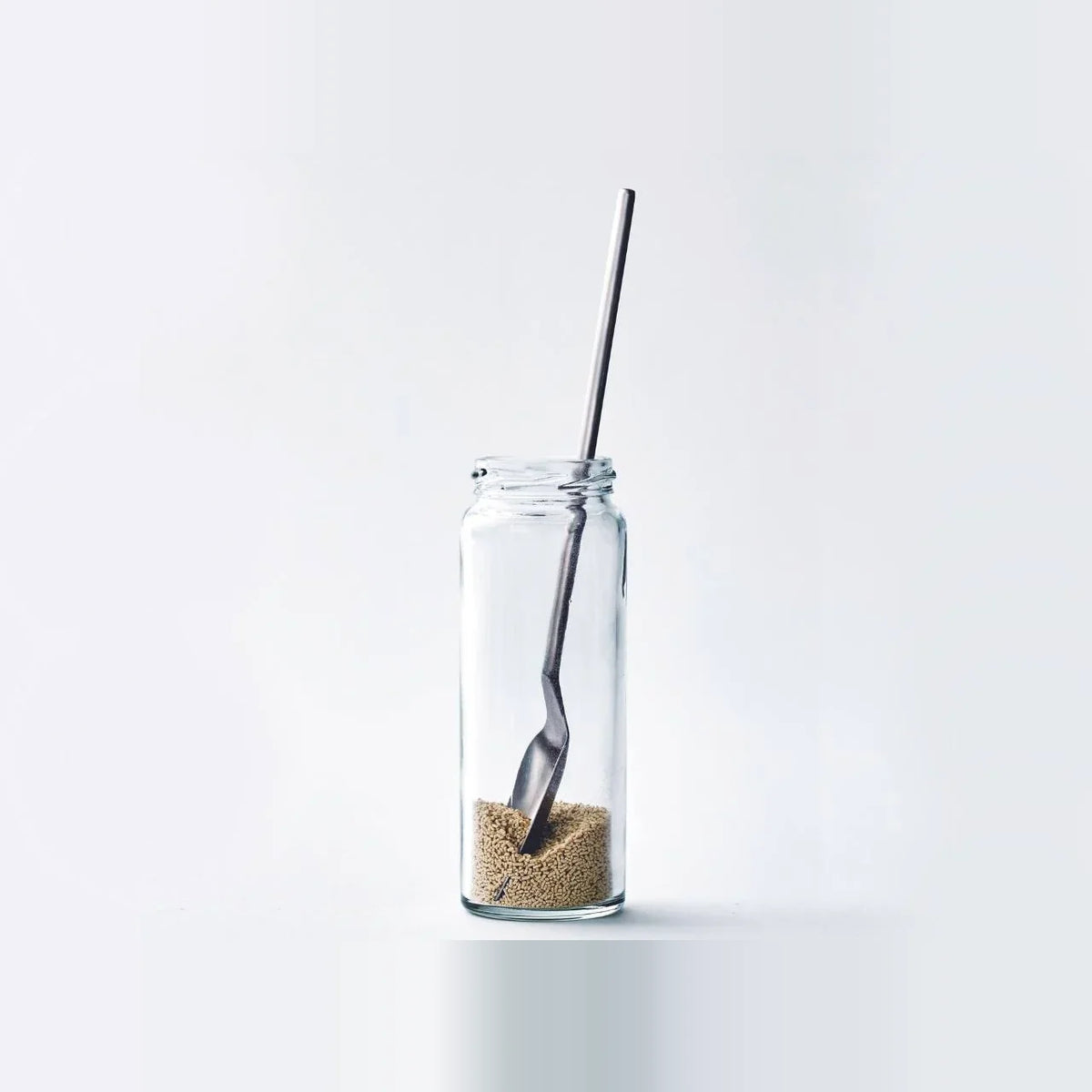 Saji long spoon standing in a jar
