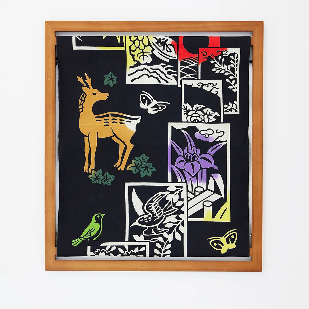 Tenugui with a deer and wildflower design displayed in the square magnetic frame