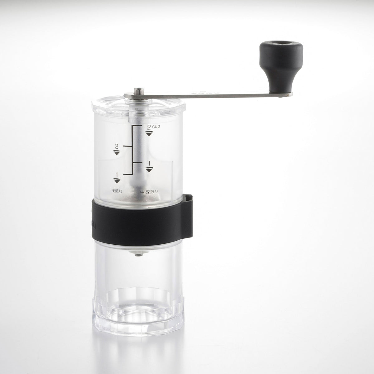 Manual coffee mill with handle attached, front view