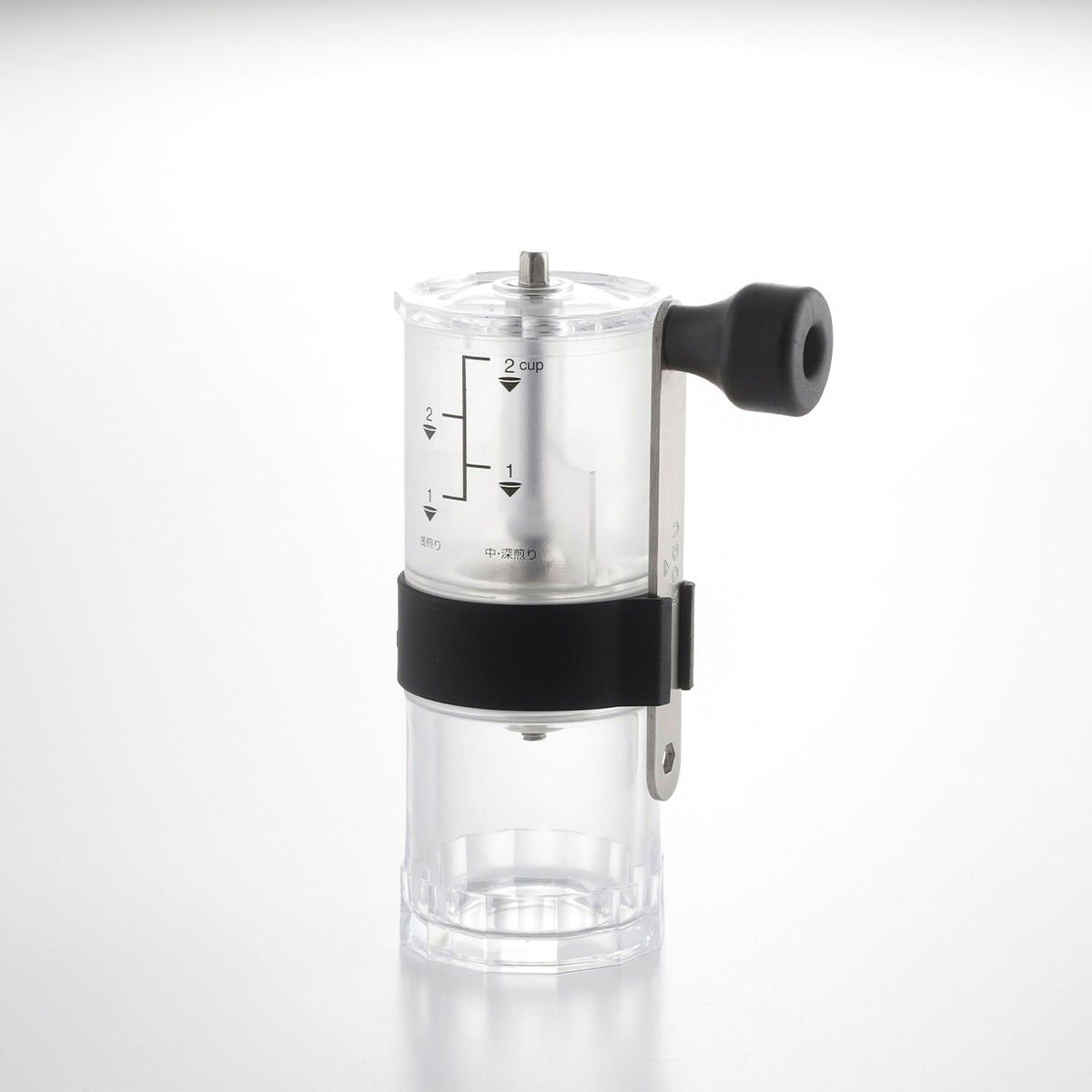 Manual coffee mill without handle, showing measuring marks
