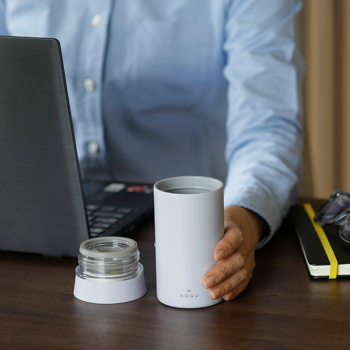 Insulated mug bottle on a desk at work