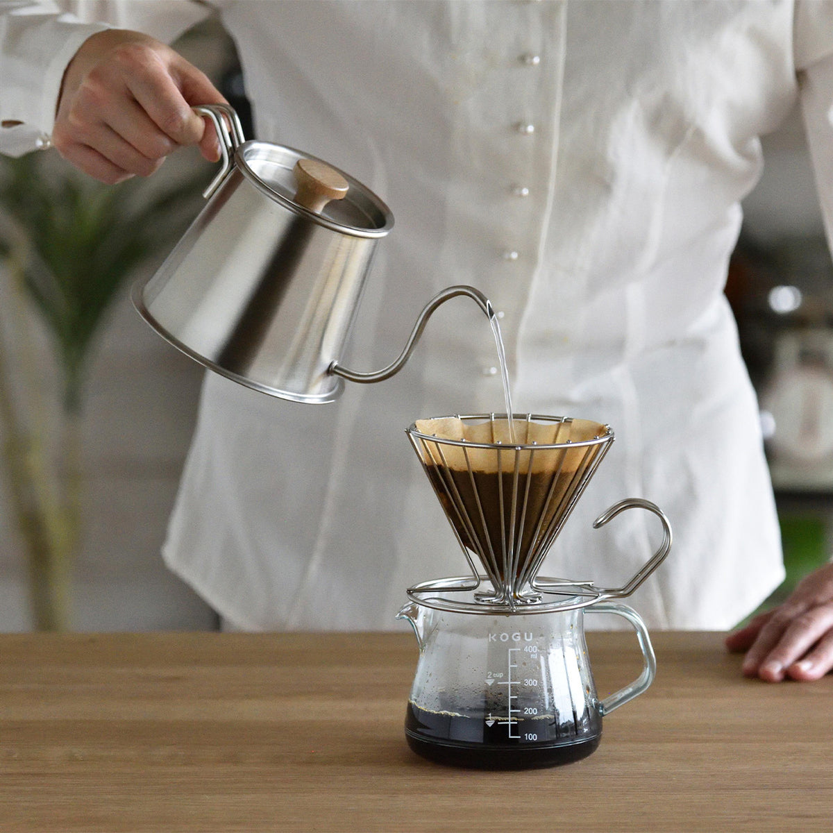 Pour-over coffee brewed with the silver Two Drip Pot Pro