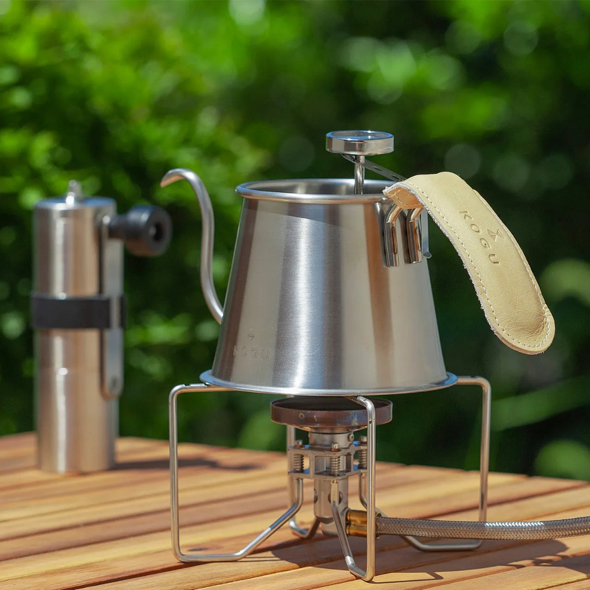 Leather handle cover on the Two Drip Pot, heated outdoors on a camping stove