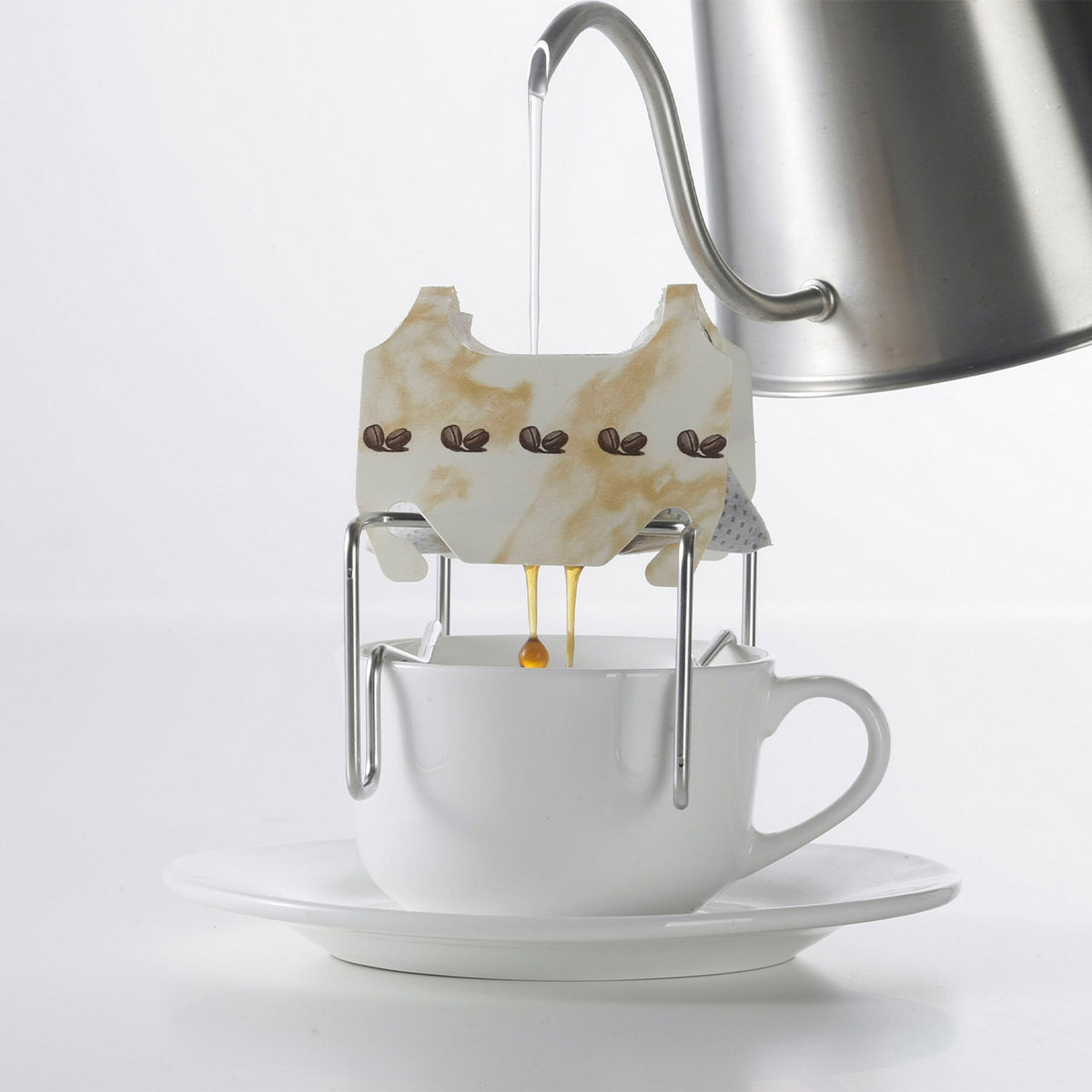 Pouring hot water into a drip bag on the stand over a cup