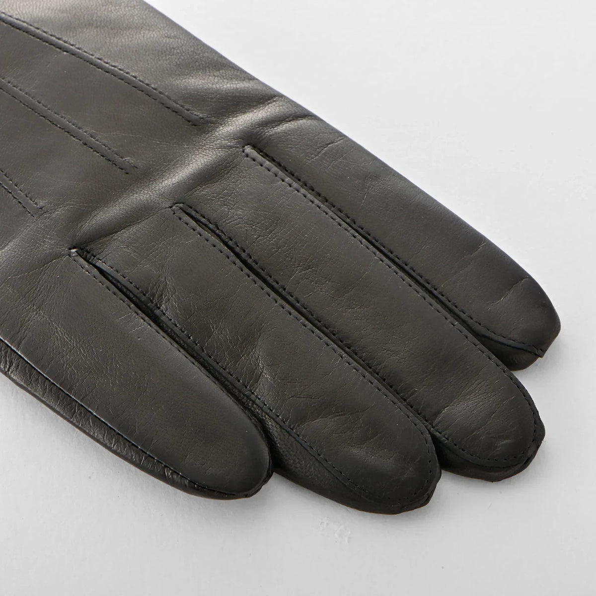 Close-up of the soft lambskin of Kuroda men’s gloves