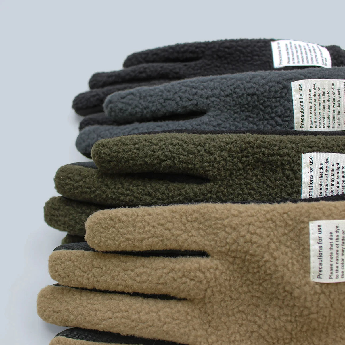 Kuroda fleece gloves stacked