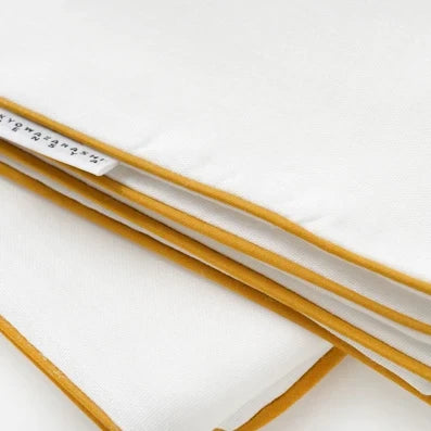 Gold-piped edges of the 5-layer gauze towels