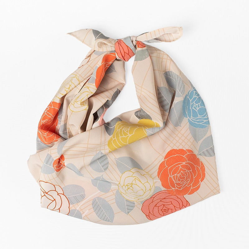NAGARE furoshiki in Otome Camellia pattern tied as a shoulder bag #Pattern_Otome Camellia