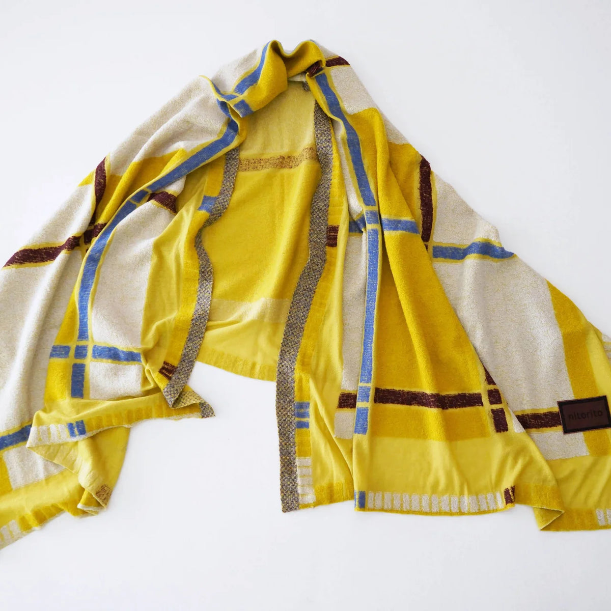 Yellow tanbo stole laid flat