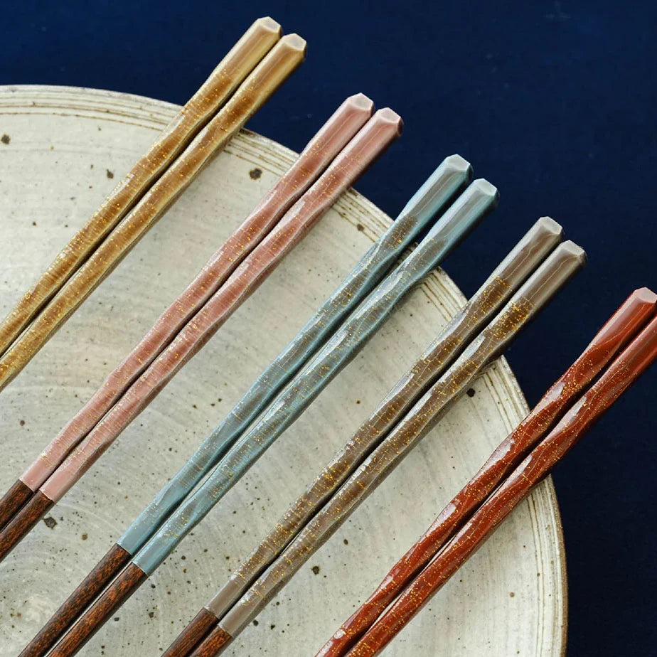 Mingei Kasane chopsticks from Obama, Fukui, in five colors on a ceramic plate