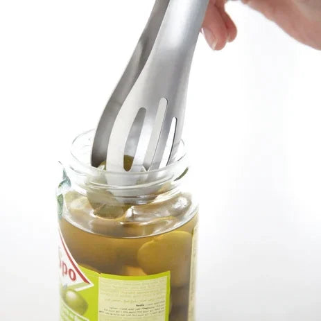Hasam tongs lifting olives from a jar