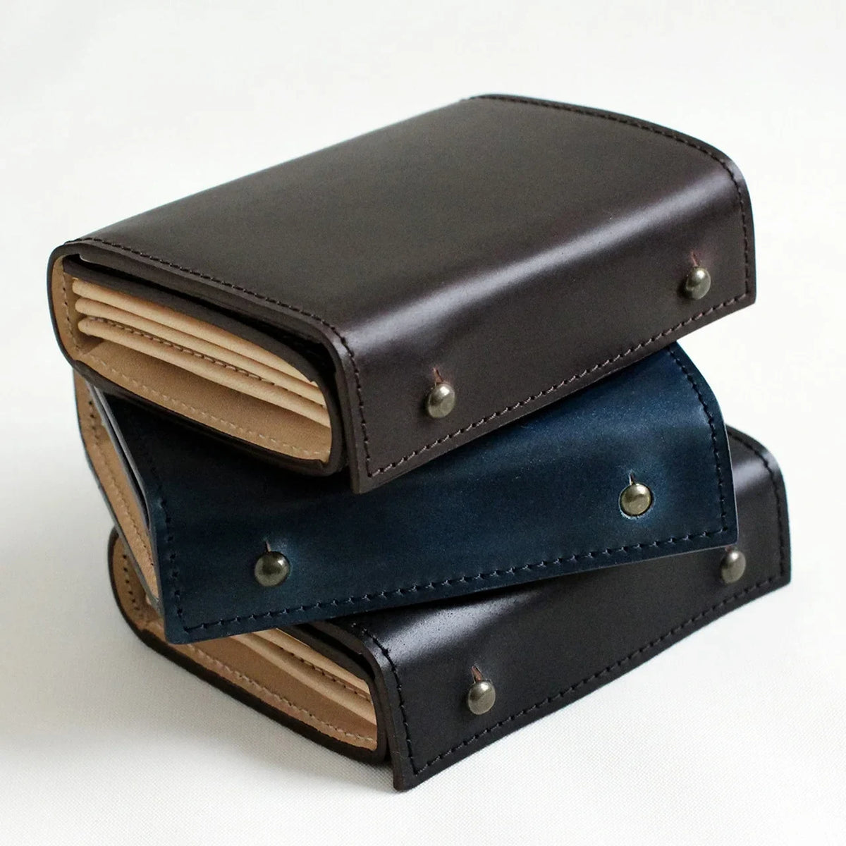 m+ millefoglie cordovan wallets stacked