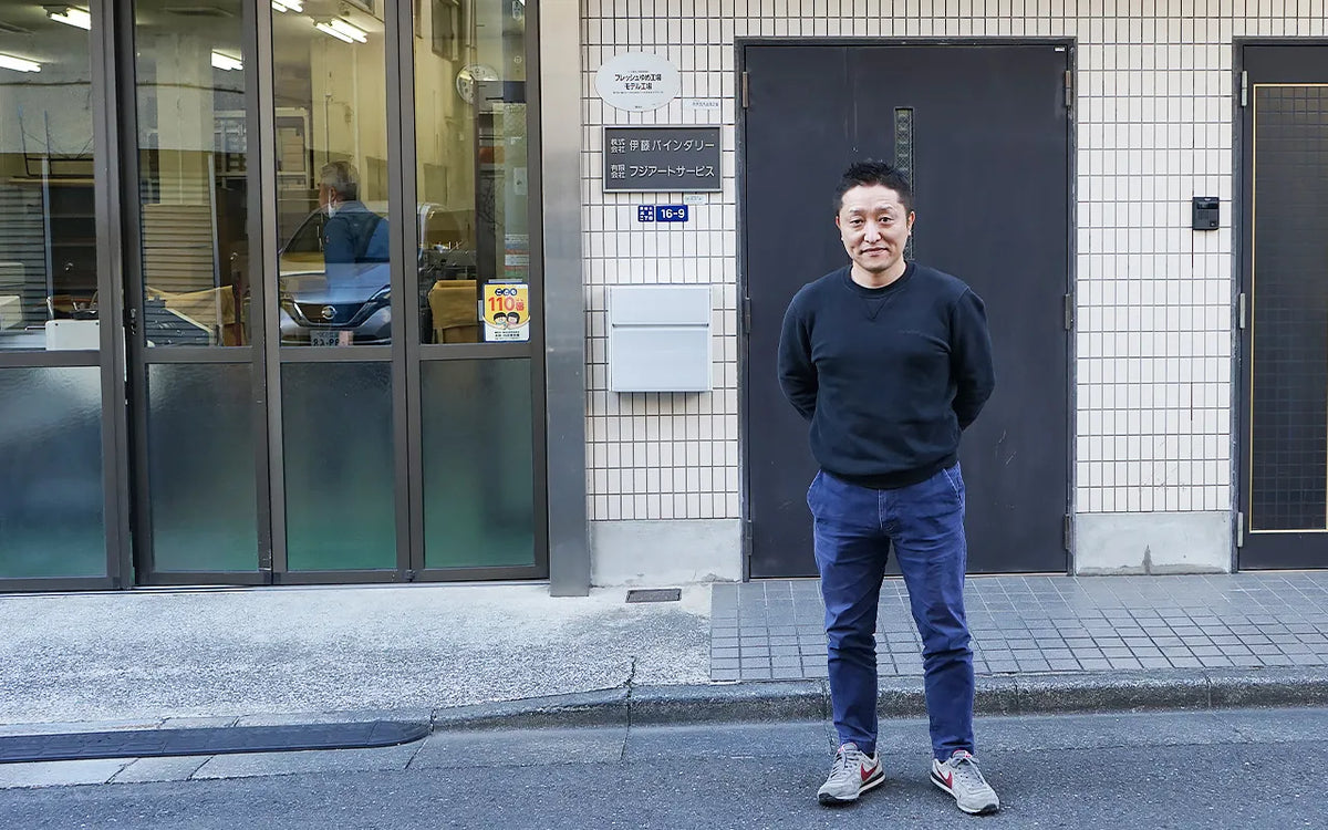 Mr. Ito, president of ITO BINDERY, in front of the company building in Tokyo