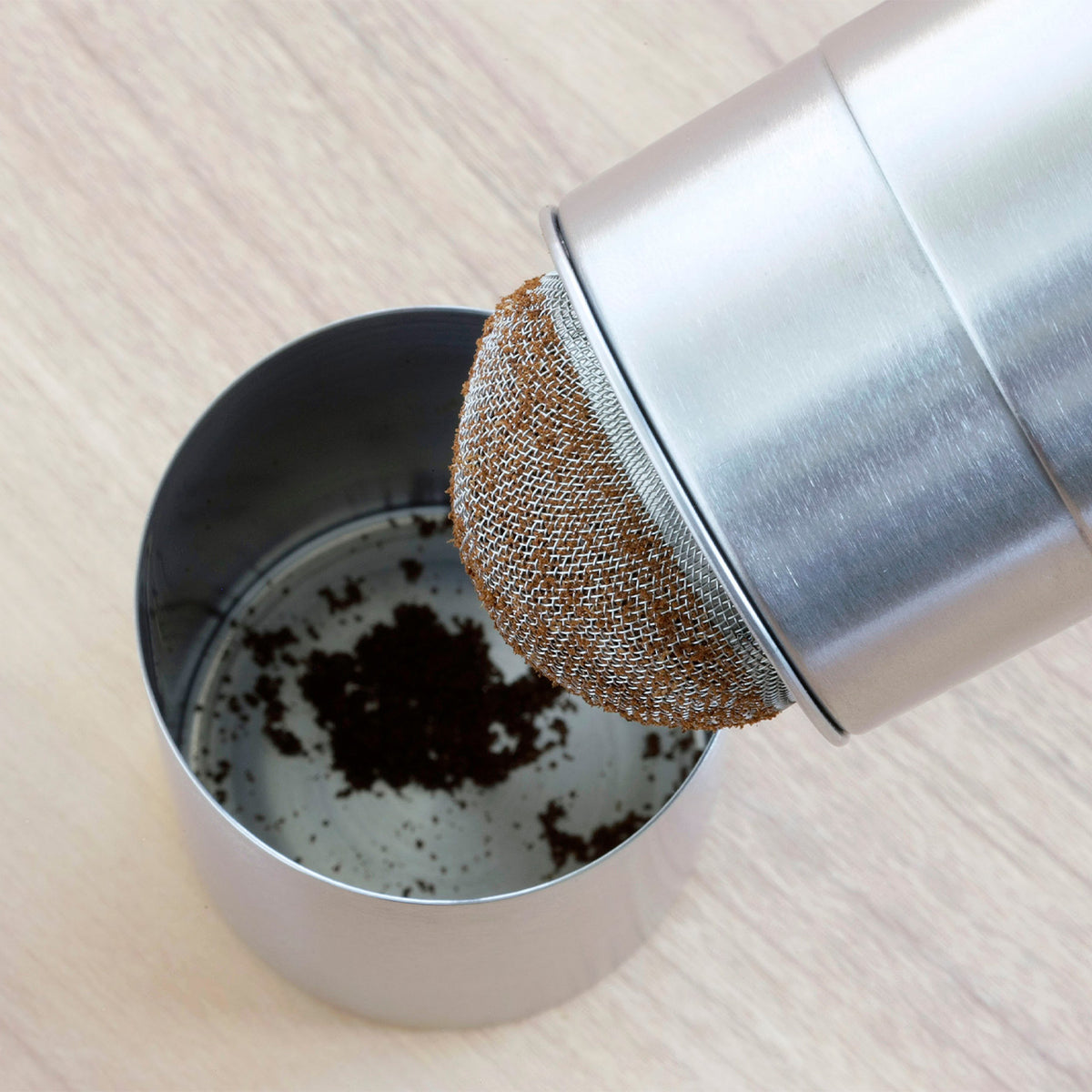 Fine powder separated by the mesh in the bottom section
