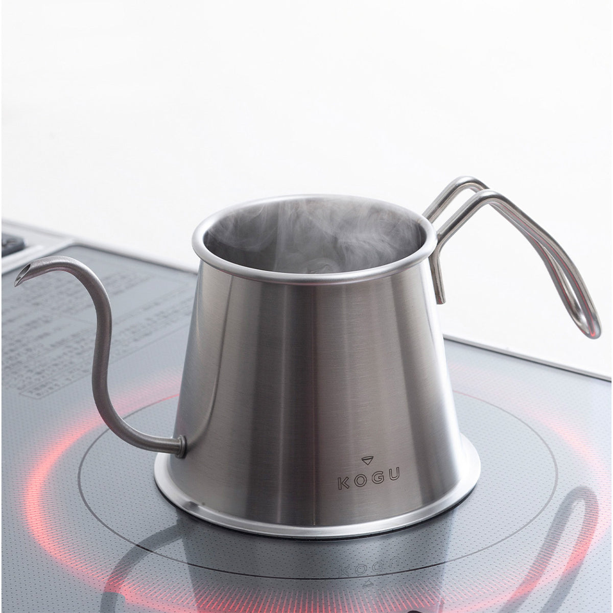 Silver Two Drip Pot Pro without lid on an IH cooktop
