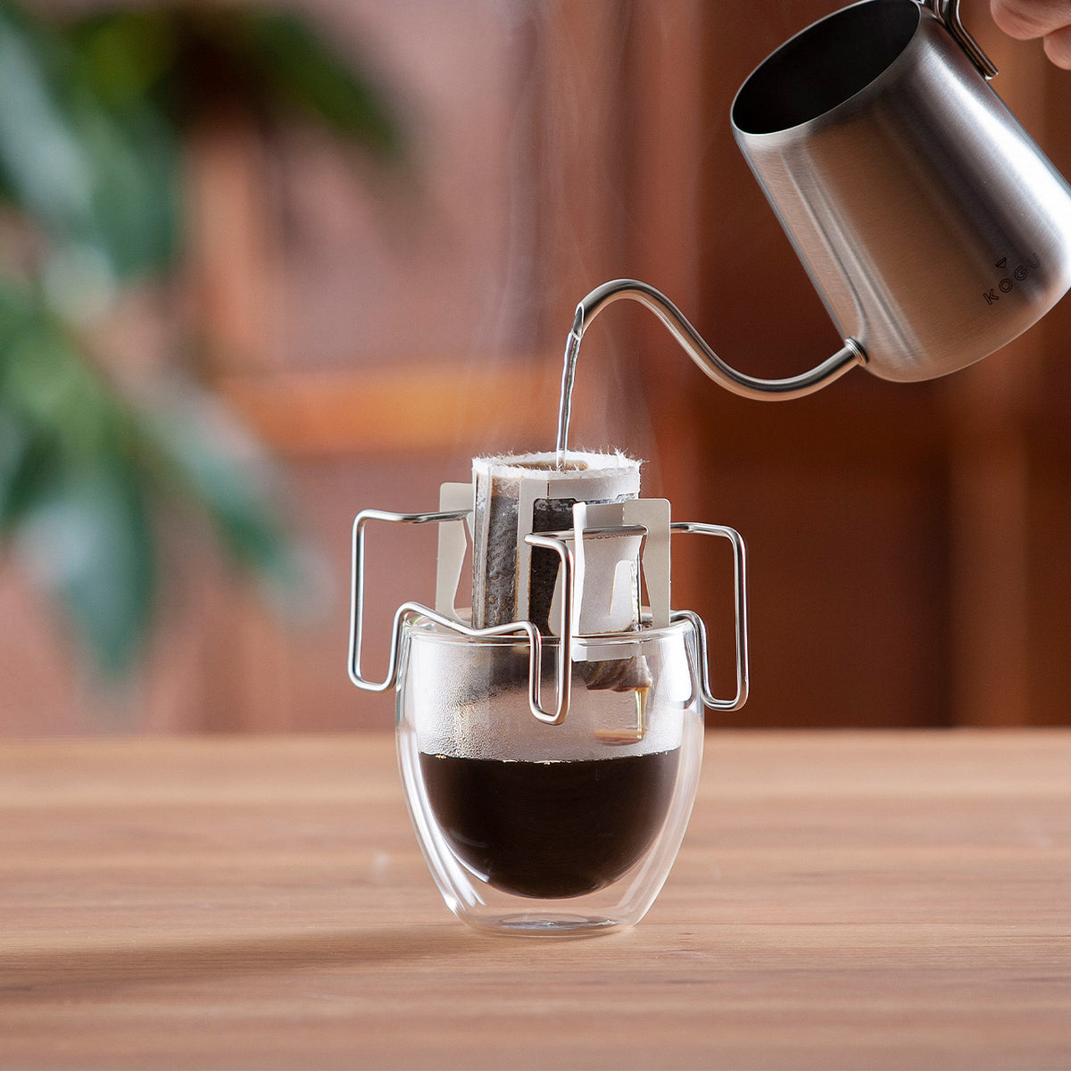 Brewing drip-bag coffee with the stand and a pour-over kettle