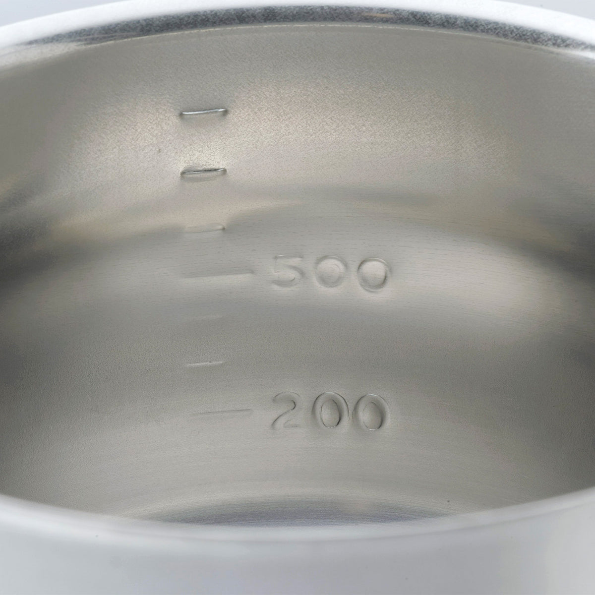 Measuring marks inside the milk pan