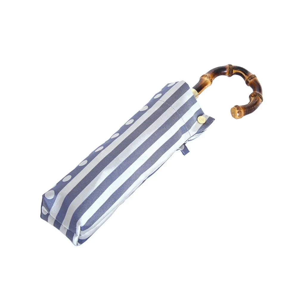 kirie Dots and Stripes folding umbrella in Ash Blue, folded #Color_Ash Blue