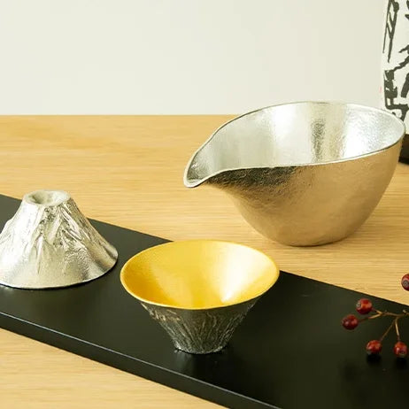 FUJIYAMA cups with a tin sake pourer on a black tray