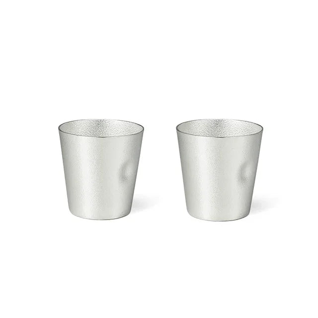 Pair of NAJIMI tin tumblers on a white background