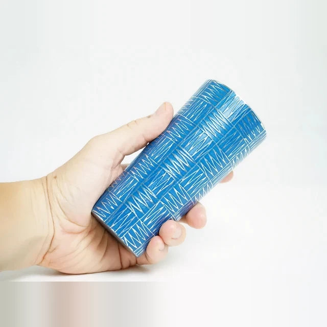 Holding the Ichimatsu tin tumbler
